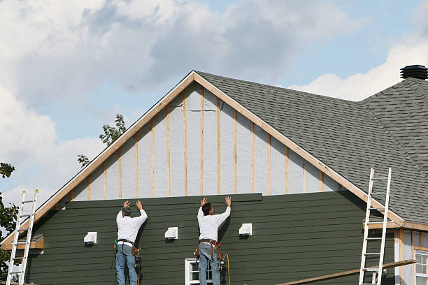 Professional Siding Contractor technician working in Faulkner, MD
